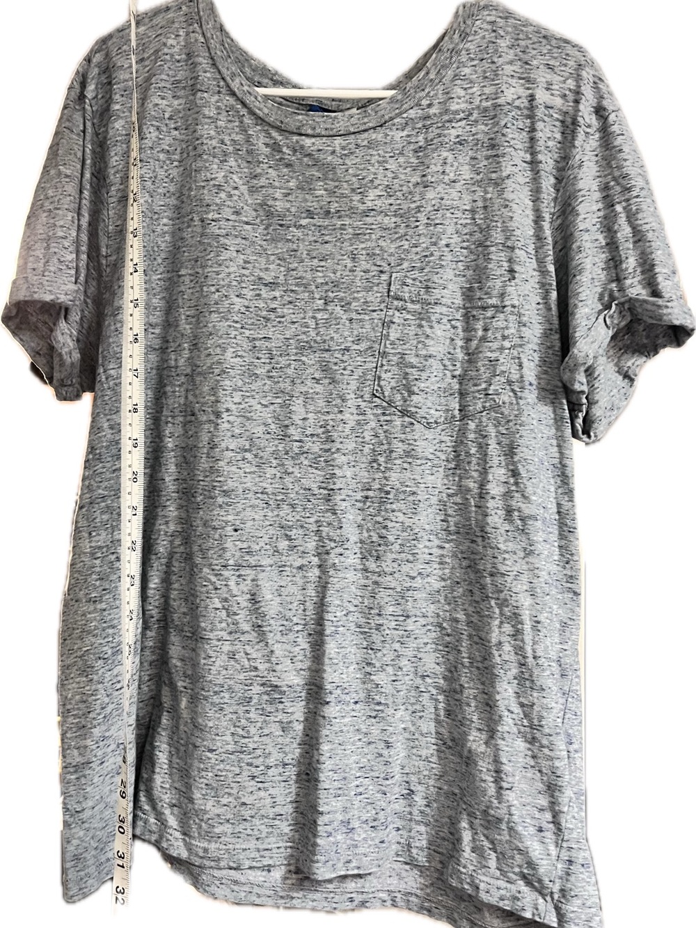 Light Heathered Blue Speckle sleeve sewn with Blue Tag divided H&M pocket tee xl
